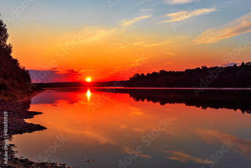 calm vyatka river at sunset on a summer evening