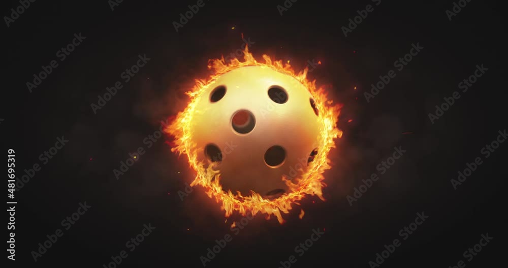 Rotating floorball ball in burning fire flames on dark background. Sport equipment as loopable 4K video background.