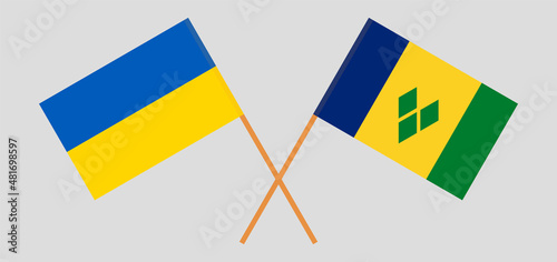 Crossed flags of Ukraine and Saint Vincent and the Grenadines. Official colors. Correct proportion