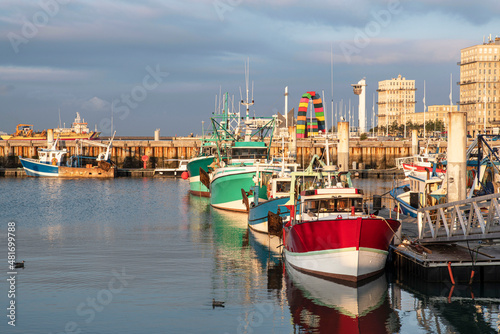 Foto Colourful fishing boats in the port of Le Havre in France