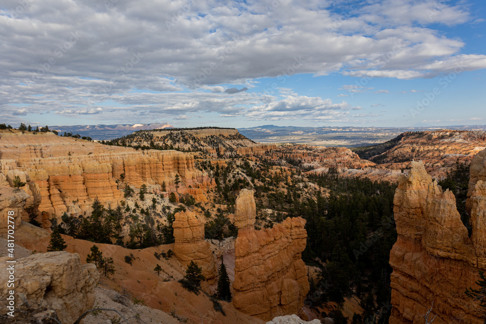 Canyons with vibrant oranges, reds, and whites