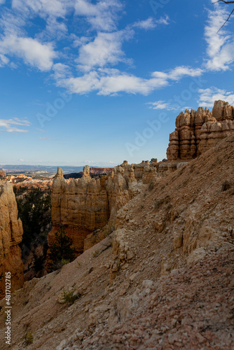 Canyons with vibrant oranges, reds, and whites