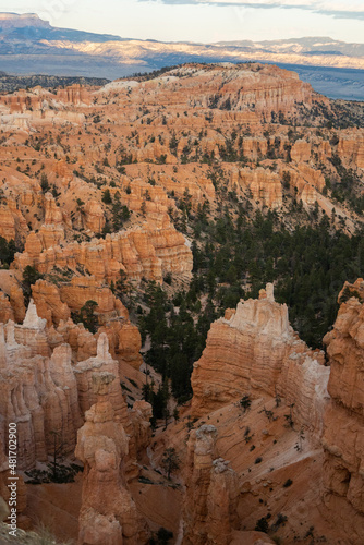Canyons with vibrant oranges, reds, and whites