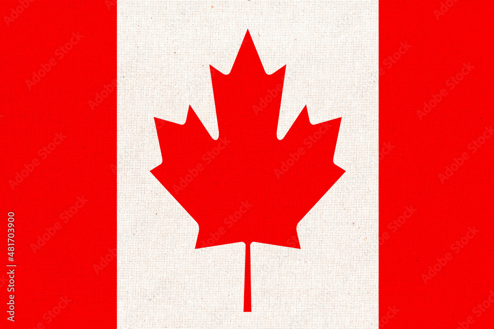 Obraz premium Flag of Canada. Canadian flag on fabric surface with red maple leaf on white