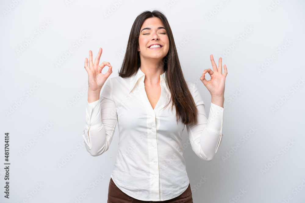 Young Brazilian woman isolated on white background in zen pose Young Brazilian woman isolated on white background in zen pose