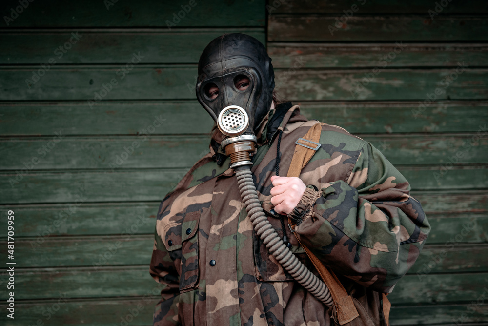 Woman with old gas mask and army jacket. Concept - Nuclear Disarmament and  Radiation Protection, epidemic, coronavirus, covid-19, pandemic Stock Photo  | Adobe Stock