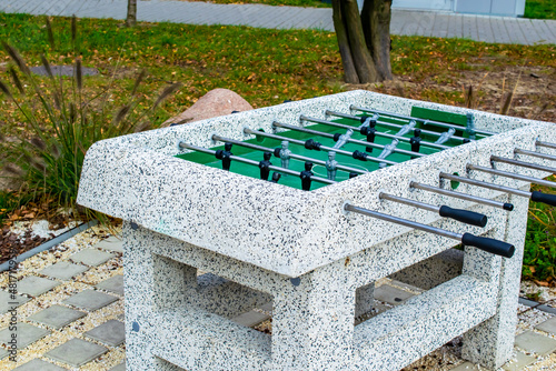 foosball sports game in a city park photo