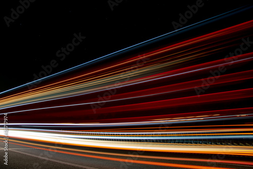 lines of lights. lights of cars with night. long exposure