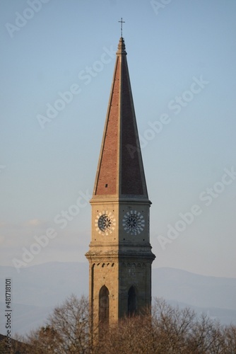 church steeple of Arezzo cathedral at sunset, Tuscany, Italy