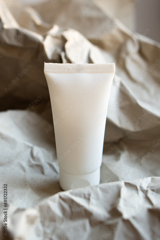 White tube of cream mock-up, design ready cosmetic and care product packaging White tube of cream mock-up, design ready cosmetic and care product packaging