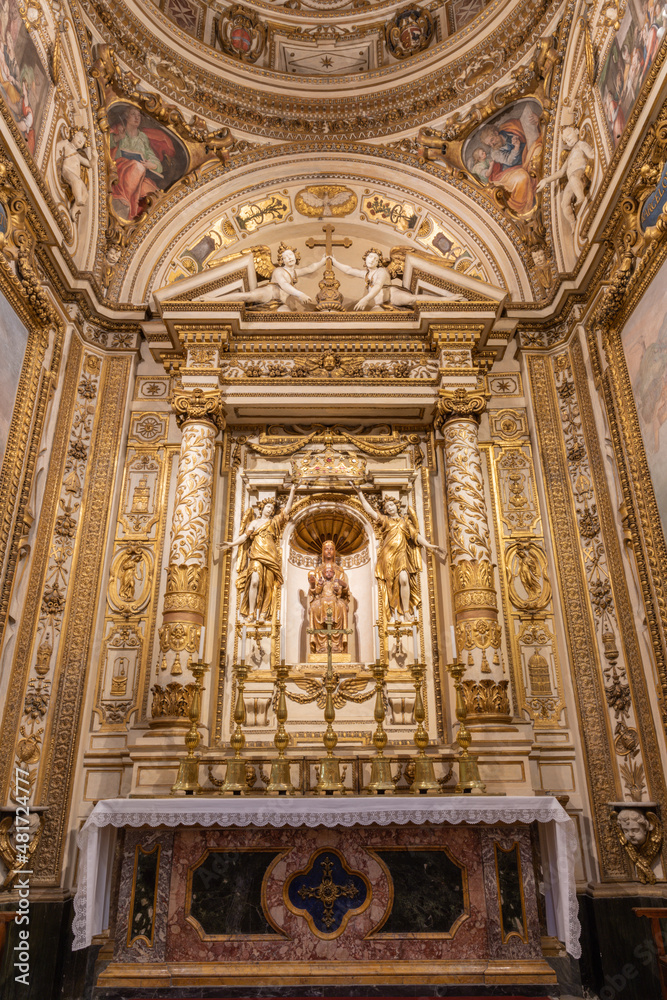 ROME, ITALY - SEPTEMBER 1, 2021: The side chapel of Santa Maria in Monserato in the same name church and central Madonna statue by Manuel Martí Cabrer from 20. cent.