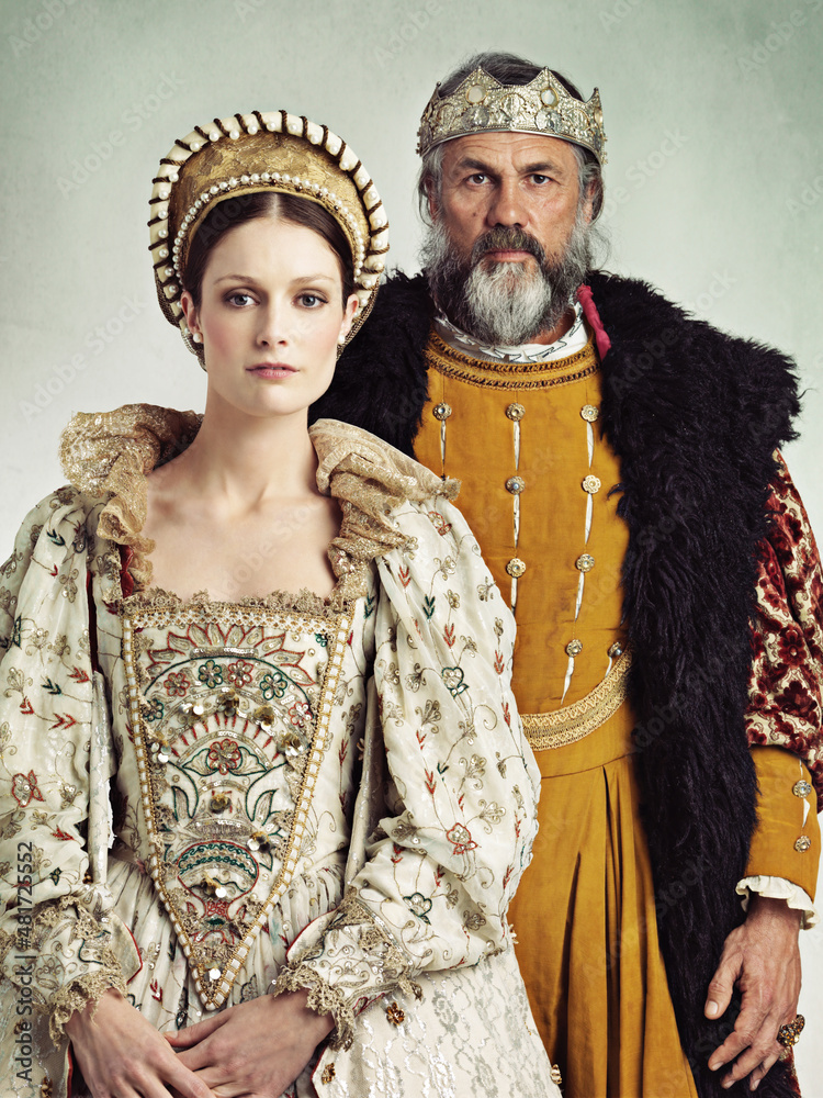 Noble rulers. Portrait of a stern-looking king and queen.