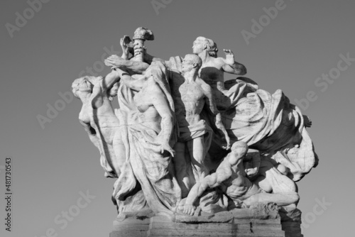 ROME, ITALY - SEPTEMBER 1, 2021: The sculpture The Fidelity to the Statute marble on the Ponte Vittorio Emanuele II bridge by Giuseppe Romagnoli (1910). © Renáta Sedmáková