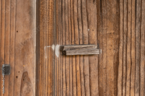 handle of wooden sliding door. © w108av22