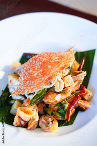 Thai spicy seafood salad with crab