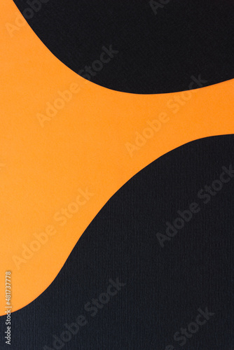 abstract paper background in orange and black