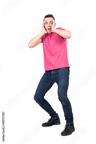 Fotografie Scared man touching head and looking at camera