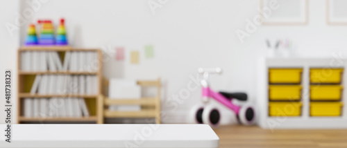 Modern baby kids playroom interior design with copy space on tabletop.