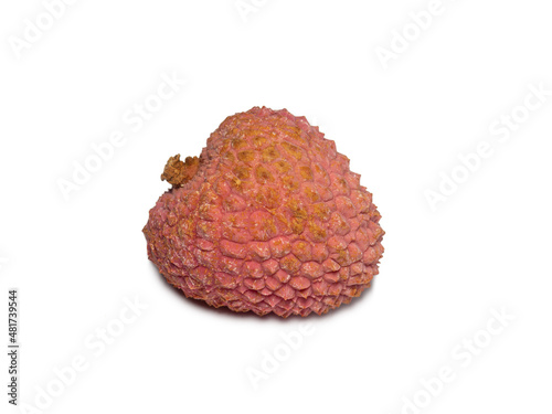 Lychee on the table. Chinese plum on a white background. Ripe fruit from Asia. Delicious product.