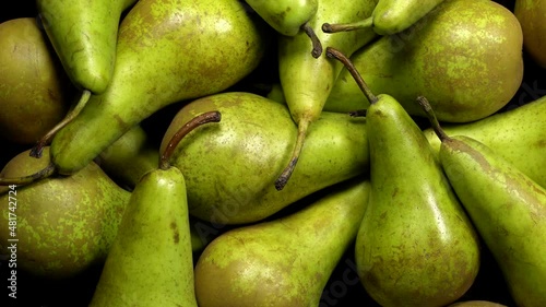 Fresh green pears rotation background. Close up