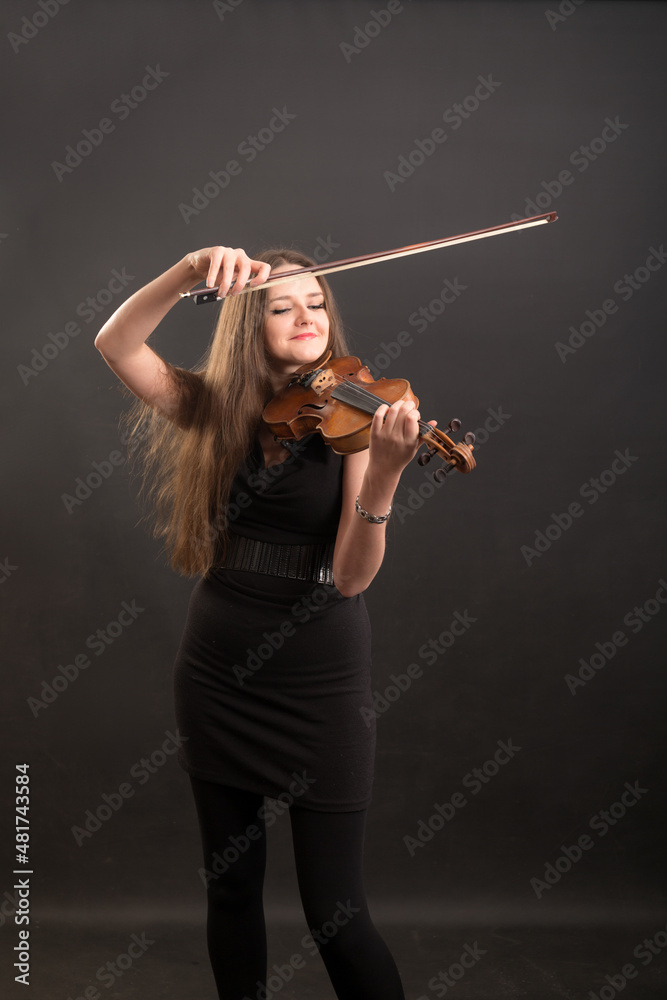 violinist in a black dress