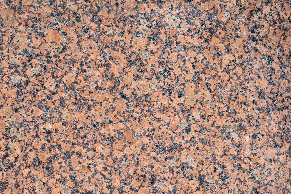 Close up, natural dark red granite marble texture. Close up, natural dark red granite marble texture.
