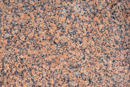 Close up, natural dark red granite marble texture. © Victor
