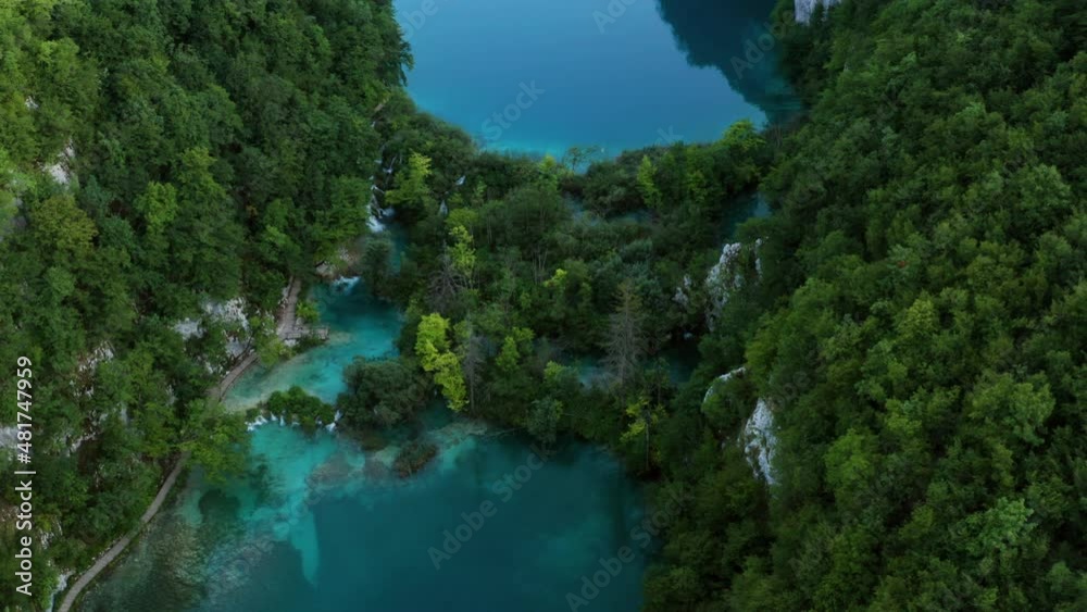 Lush Vegetations On Limestone Canyons At Plitvice Lakes National Park In Croatia. Aerial Pullback Lush Vegetations On Limestone Canyons At Plitvice Lakes National Park In Croatia. Aerial Pullback