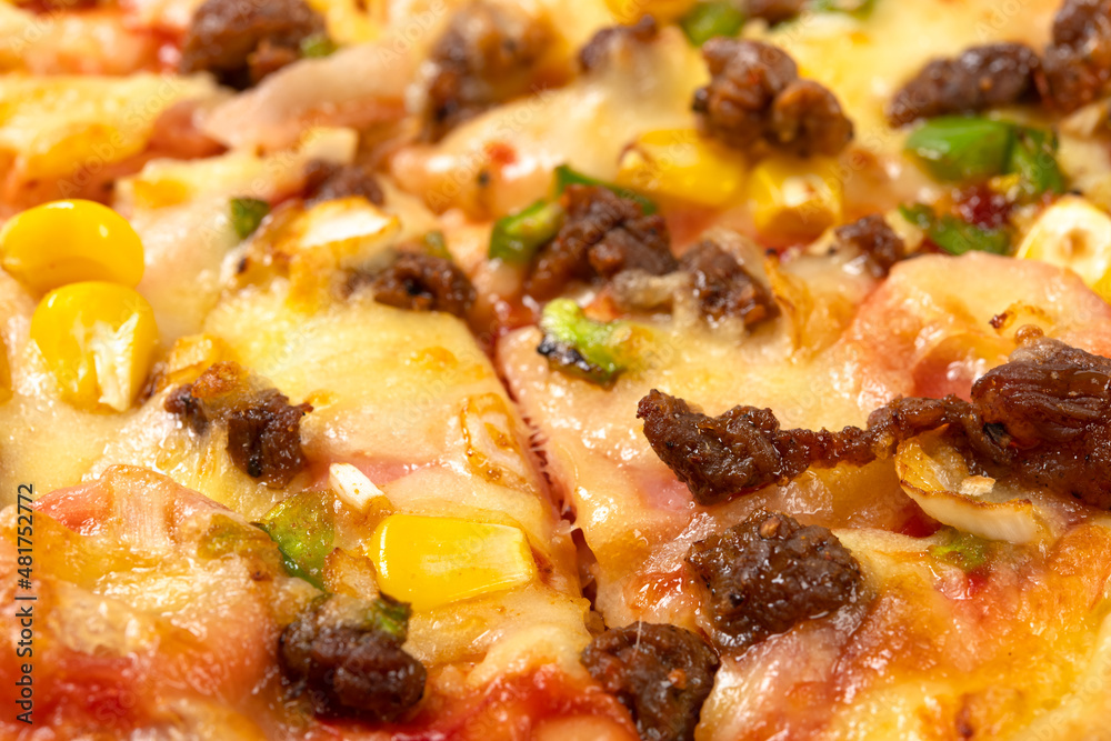 angle view fresh pizza with beef and bacon toppings close up angle view fresh pizza with beef and bacon toppings close up