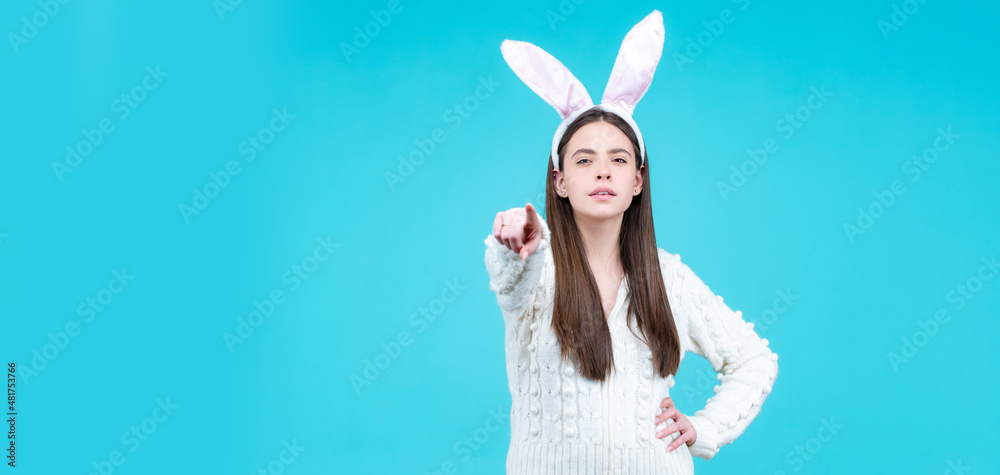 Easter banner with bunny woman. Model dressed in costume Easter bunny. Bunny girl celebrating easter on isolated background. Easter banner with bunny woman. Model dressed in costume Easter bunny. Bunny girl celebrating easter on isolated background.