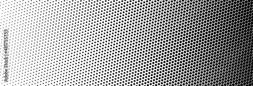 The halftone texture is black and white. Monochrome abstract, chaotic texture. Waves of dots on a white background, abstract halftone