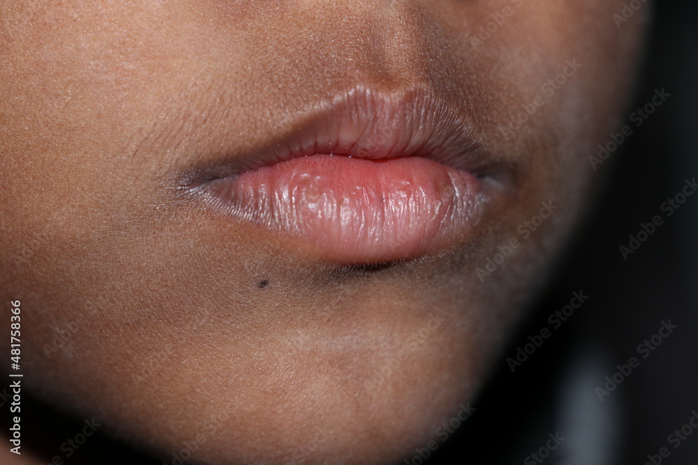 close up of a lips with a smile close up of a lips with a smile