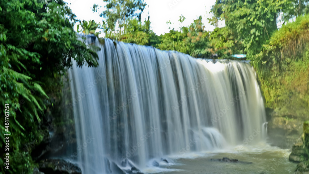 Naklejka premium Landscape photo, Temam Waterfall, beautiful waterfall in Lubuk Linggau, South Sumatera province, Indonesia