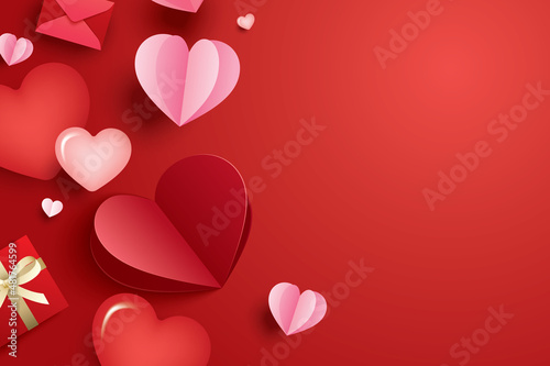 Happy valentines day with paper hearts and copy space on red background. © kaisorn
