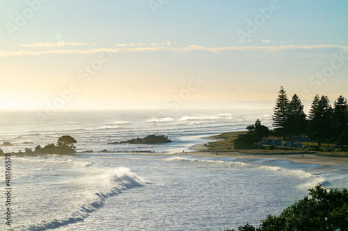 Mount maunganui main beach shrouded in sea haze caused by large surf from Cyclone Cody.