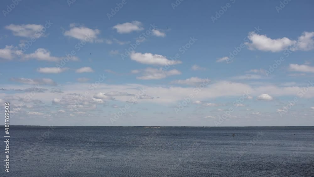 beautiful background of blue sky with clouds on the background of sea water beautiful background of blue sky with clouds on the background of sea water