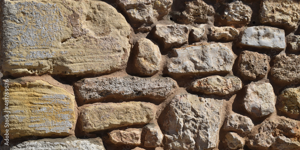 Fototapeta premium Fondo de ladrillos de piedra apilados.