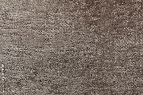 texture of velour fabric imitating decorative plaster