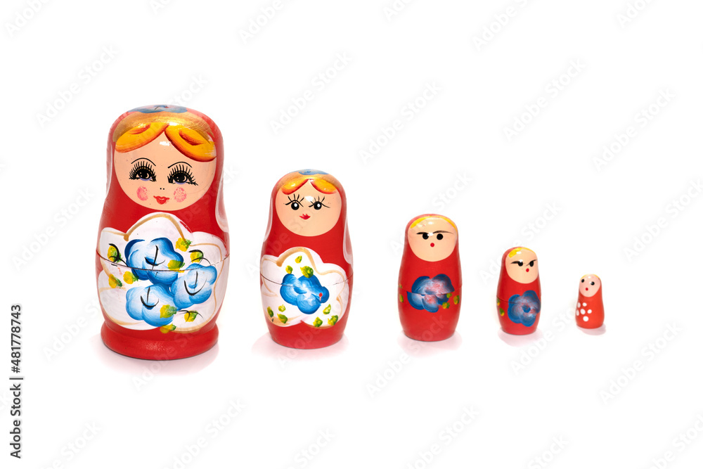 Red dolls on a white background. Russian national souvenir. Matryoshka.