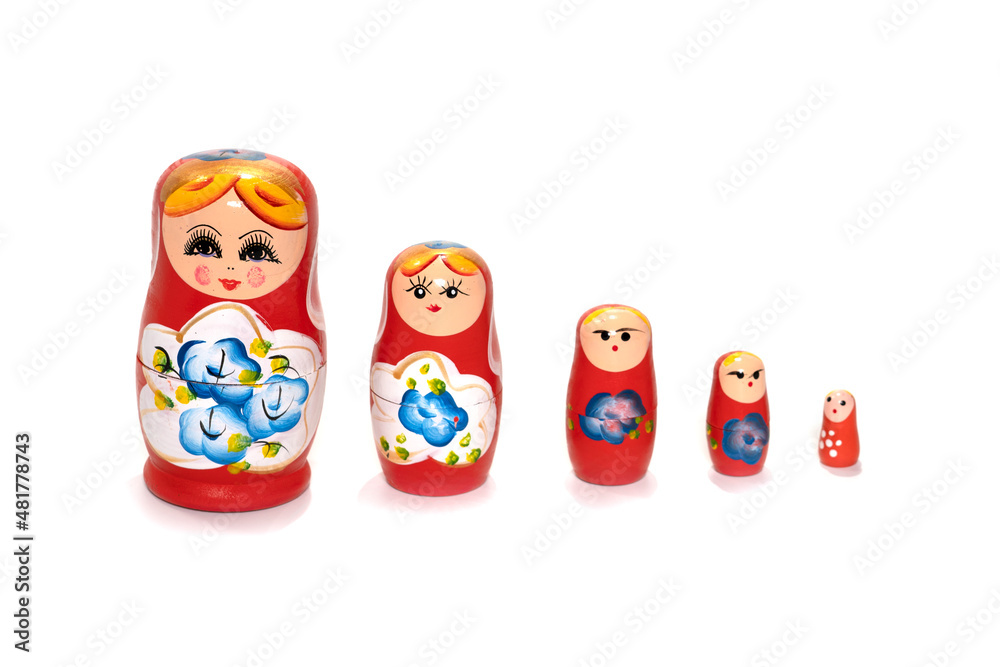 Red dolls on a white background. Russian national souvenir. Matryoshka. Red dolls on a white background. Russian national souvenir. Matryoshka.