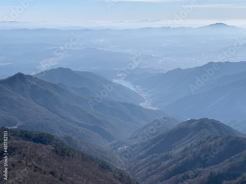 한국 소백산 정상과 능선, 억새 풍경, 등산하는 여자 / The summit of Sobaeksan Mountain in Korea, ridges, silver grass scenery, and a woman hiking 