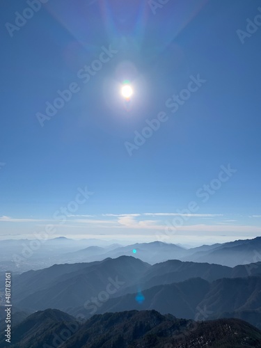 한국 소백산 정상과 능선, 억새 풍경, 등산하는 여자 / The summit of Sobaeksan Mountain in Korea, ridges, silver grass scenery, and a woman hiking 