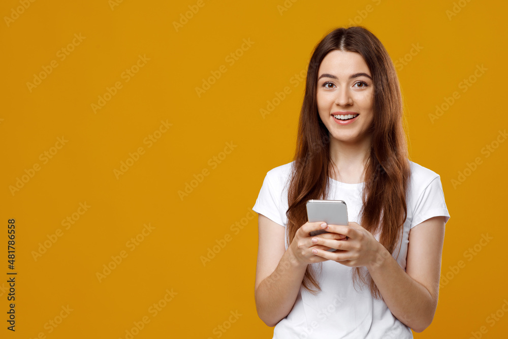 Pretty caucasian lady using brand new smartphone, copy space Pretty caucasian lady using brand new smartphone, copy space