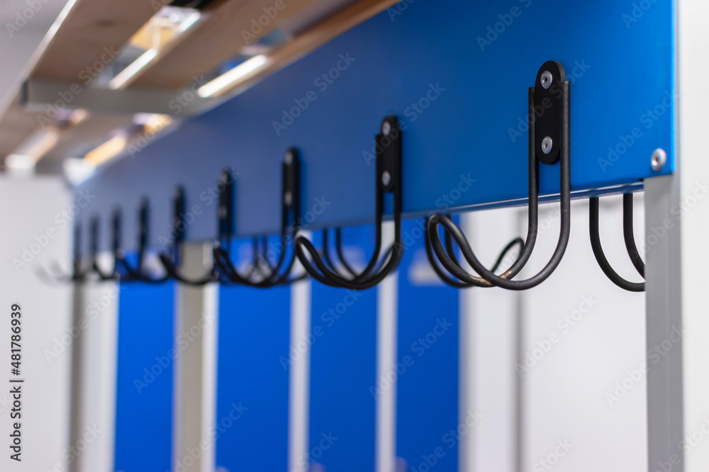 Perspective of hangers in community locker room
