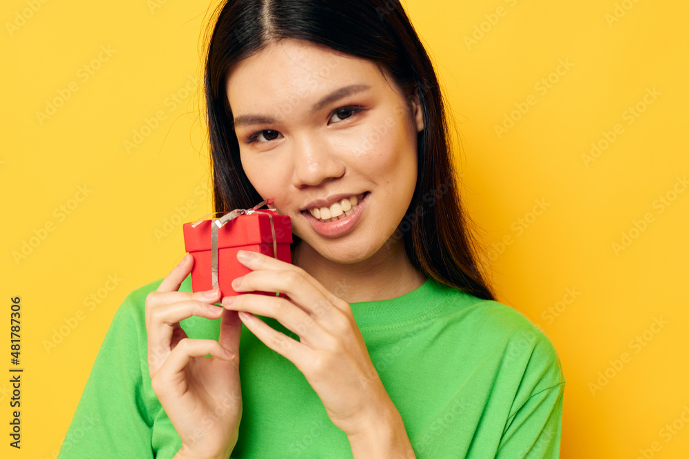 Portrait Asian beautiful young woman Red gift box happy Birthday isolated background unaltered Portrait Asian beautiful young woman Red gift box happy Birthday isolated background unaltered