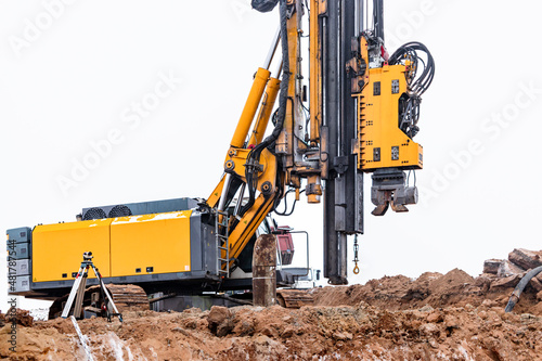 A powerful drilling rig for peeling at a construction site. Operation of the drilling rig in northern conditions. Pile foundations. Bored piles.