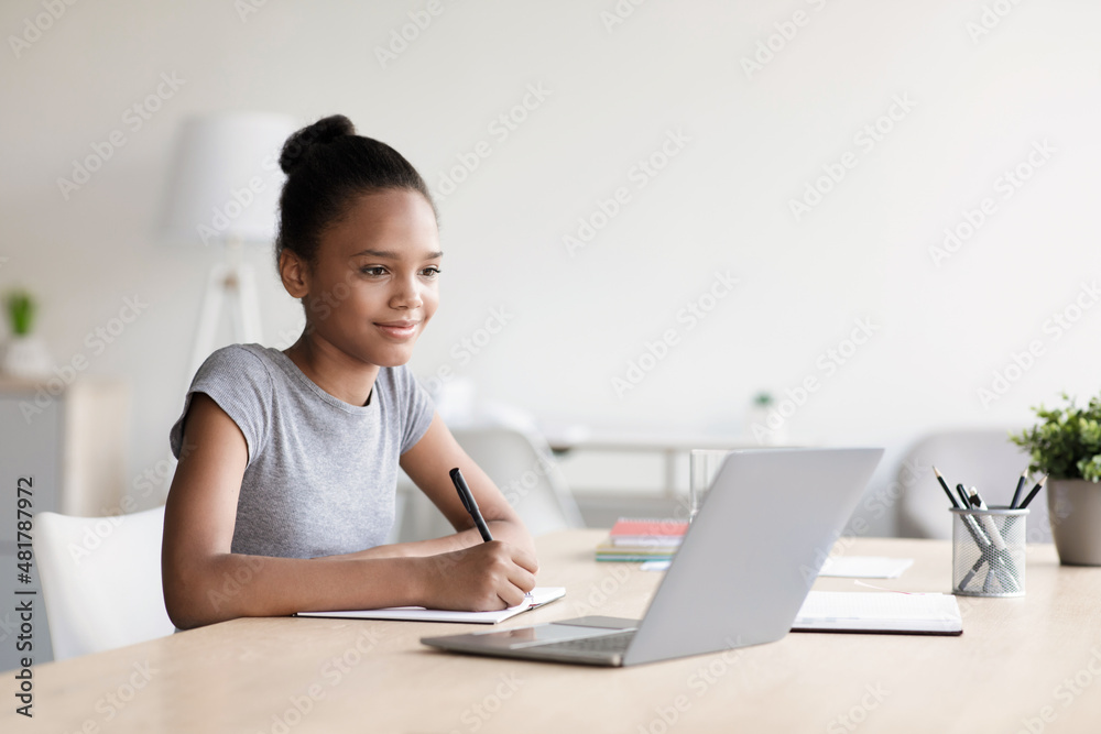 Pretty schoolgirl study, homework, online lesson at home, social distance, self-isolation, online education Pretty schoolgirl study, homework, online lesson at home, social distance, self-isolation, online education