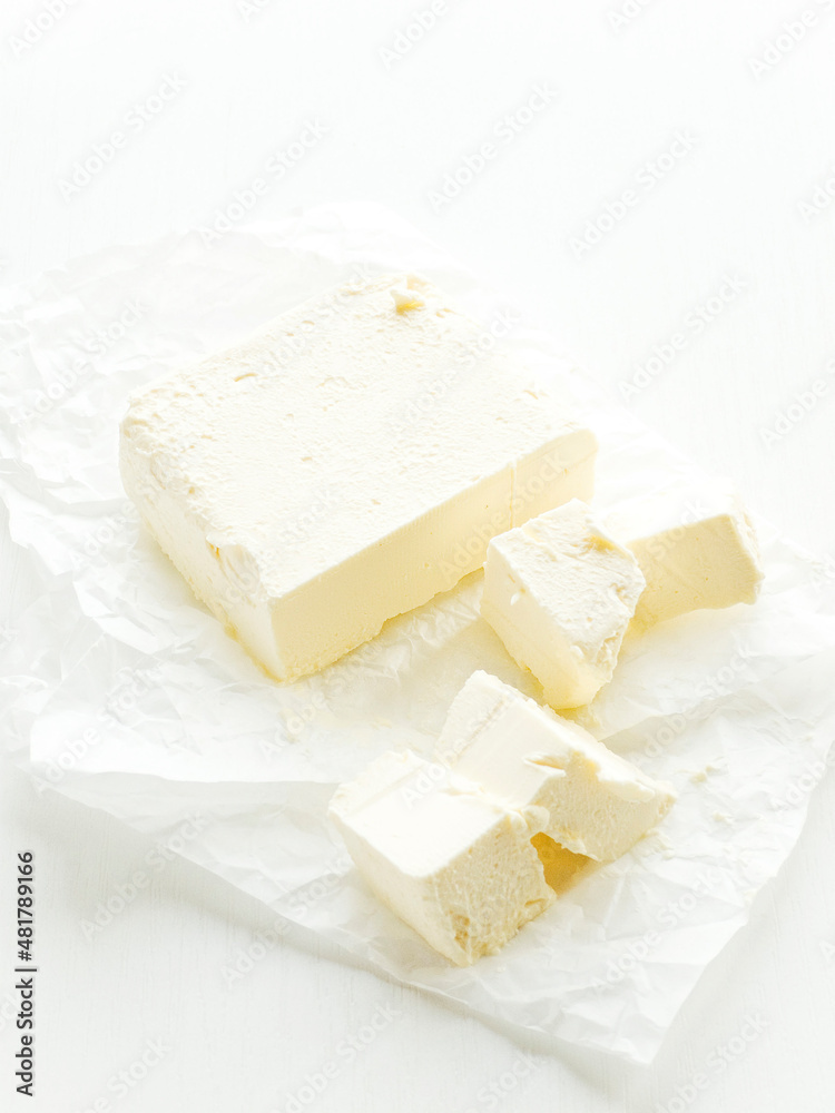 Cream butter on white