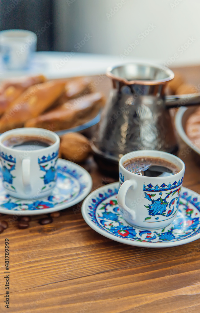 Baklava on the table and Turkish coffee. Selective focus. Baklava on the table and Turkish coffee. Selective focus.