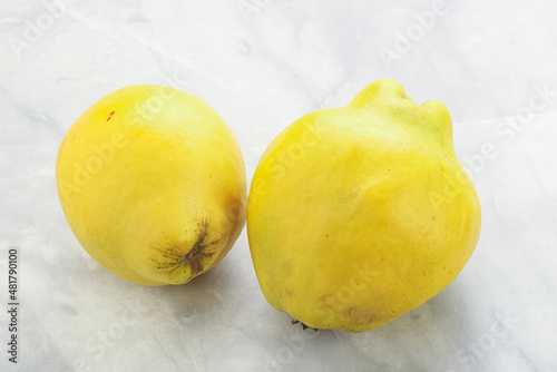 Fresh ripe yellow quince fruit